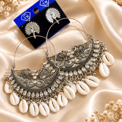 KANYORA Peacock Shell Oxidized Silver Garba Earrings
