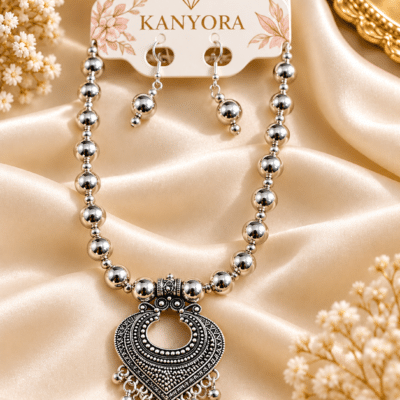 KANYORA Silver Oxidized Heart Pendant Garba Necklace Set